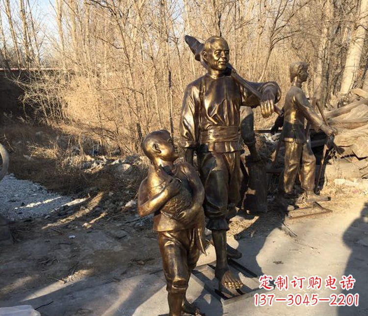 合肥抱着鱼的儿童街边小品铜雕