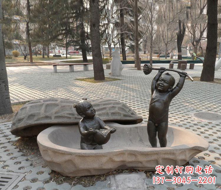 合肥拿莲蓬和石榴的小孩铜雕
