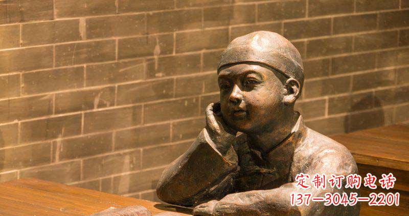 合肥商场坐在桌前看书的小孩景观铜雕