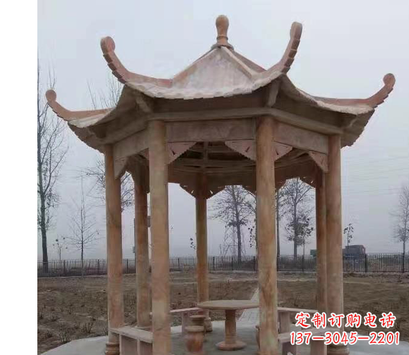 合肥公园晚霞红八角石雕凉亭